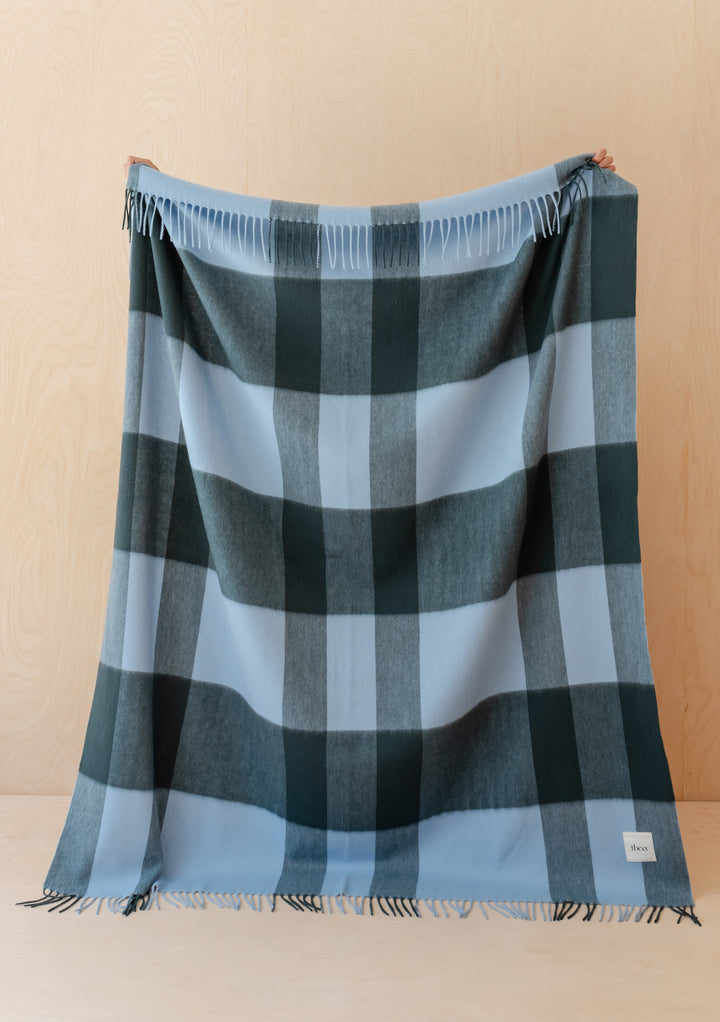 Lambswool Blanket in Green Modern Check by TBCo with fringed edges and soft wool in dark green and blue tones