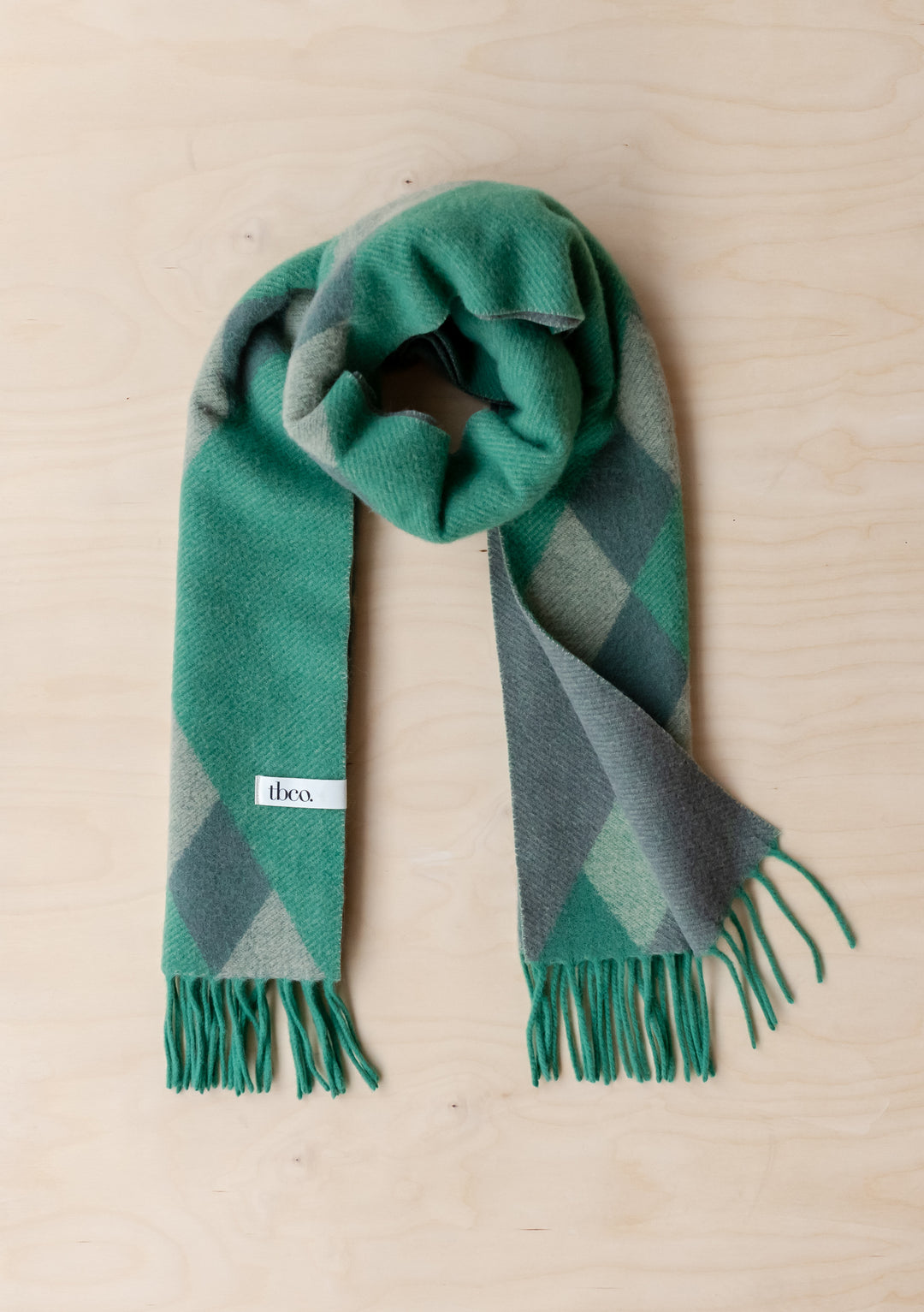 Lambswool Oversized Scarf in Green Diamond Jacquard by TBCo with soft fringes and cosy jacquard pattern