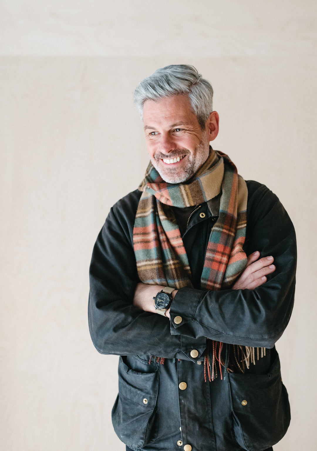 TBCo Stewart Dress Antique Tartan cashmere scarf styled with black jacket showing luxurious pattern and fringed detail