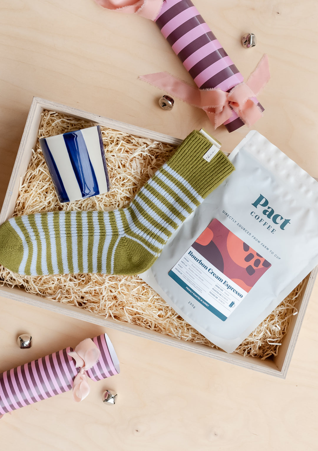Ready-Made Coffee Lovers Gift Box by TBCo with olive stripe merino socks, coffee, and navy stripe mug in gift wrap