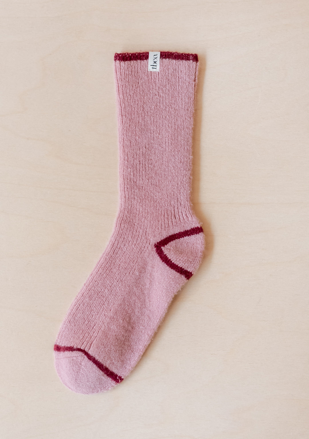 TBCo Cashmere & Merino Tipped Socks in pink with burgundy accents on heel, toe and cuff, displayed on cream background