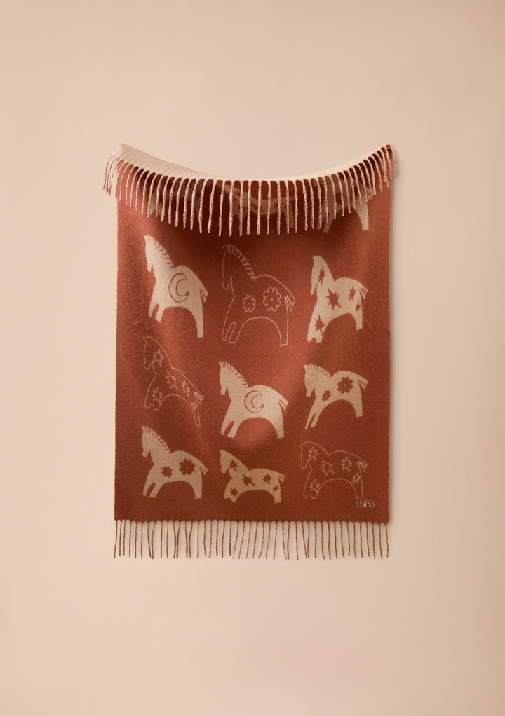 Lammwoll-Babydecke in Rostgalopp
