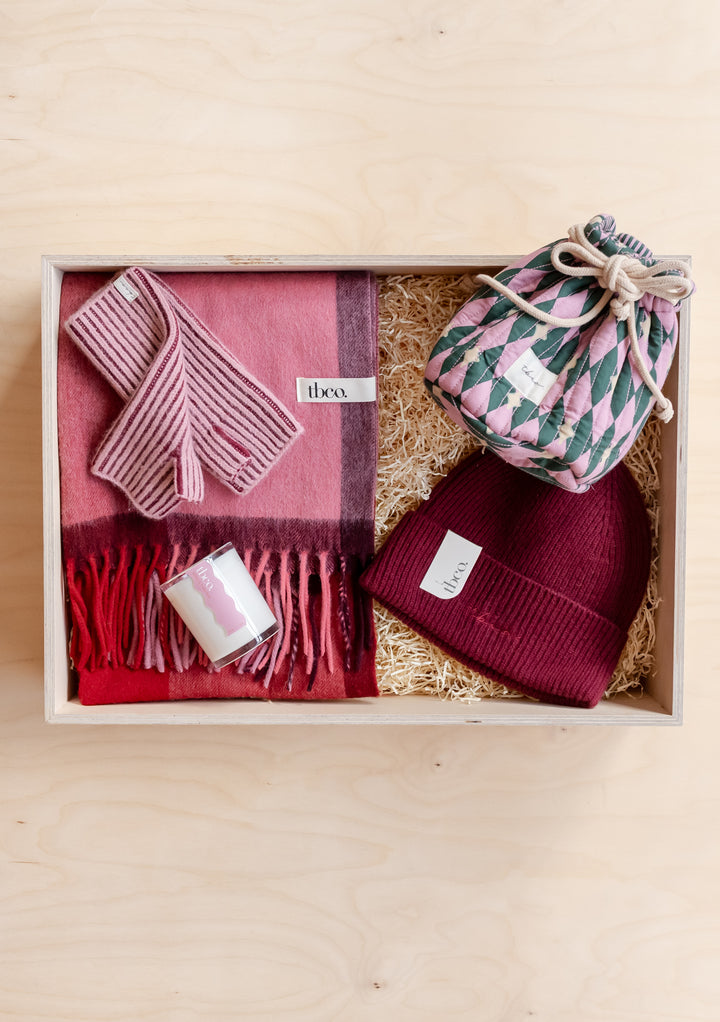 TBCo Gift Box For Her with cosy scarf, knitted hat, scented candle, and patterned drawstring pouch in a wooden box