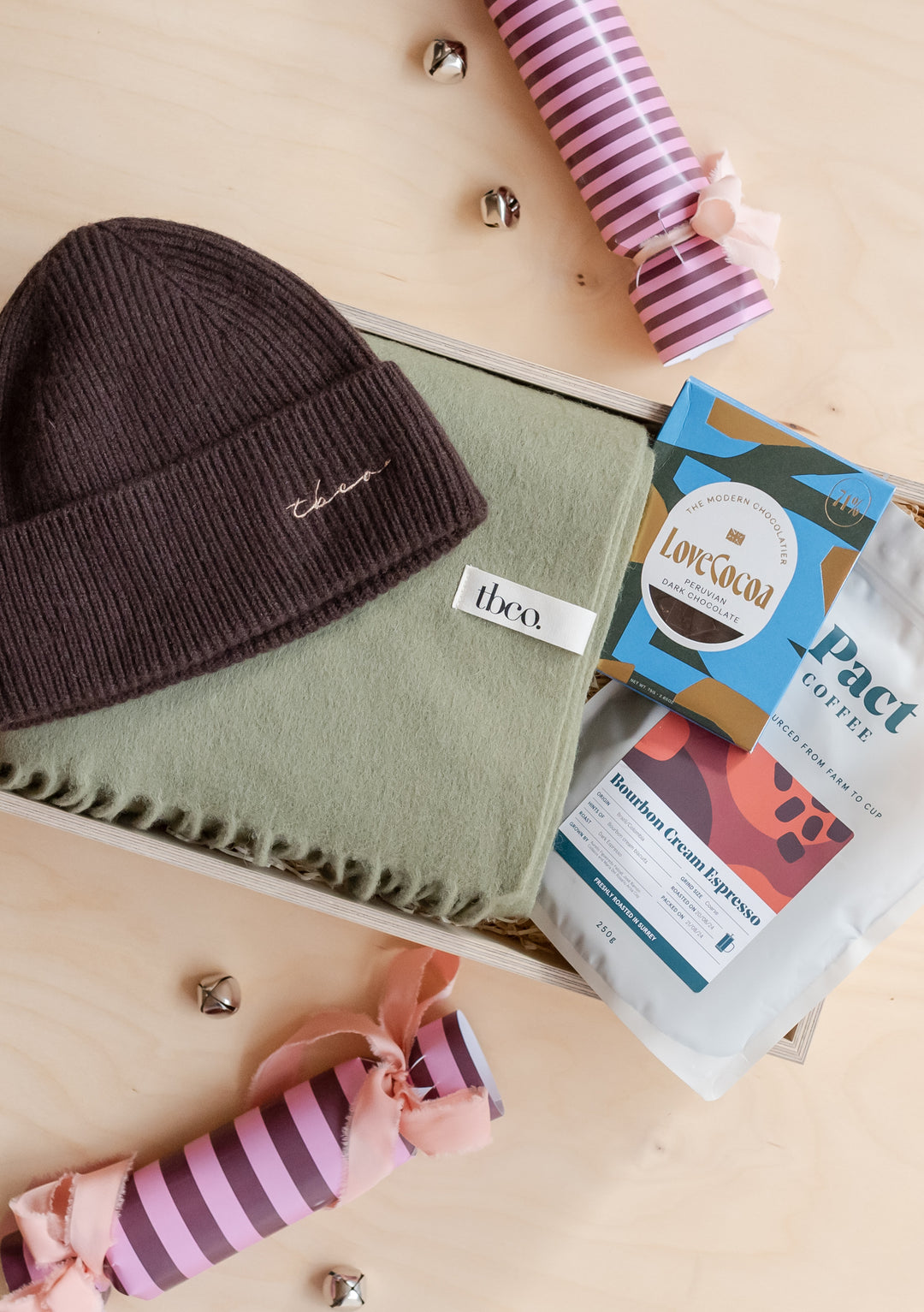 TBCo Gift Box For Him featuring a warm hat, soft scarf, coffee, and chocolate in an elegant presentation box