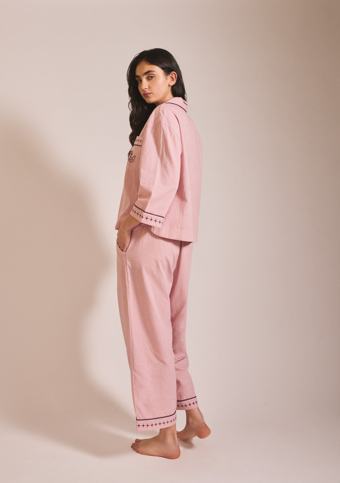 Model wearing TBCo Cropped Cotton & Linen Pyjamas in Pink with blackberry embroidery side view portrait gallery 4