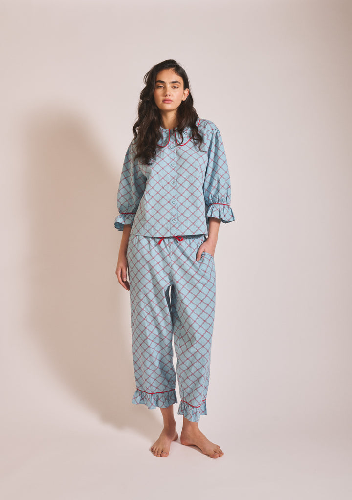 Model wearing TBCo Cropped Cotton Pyjamas in Blue Lattice, gallery image 3, 1442x2048 portrait view, relaxed pose