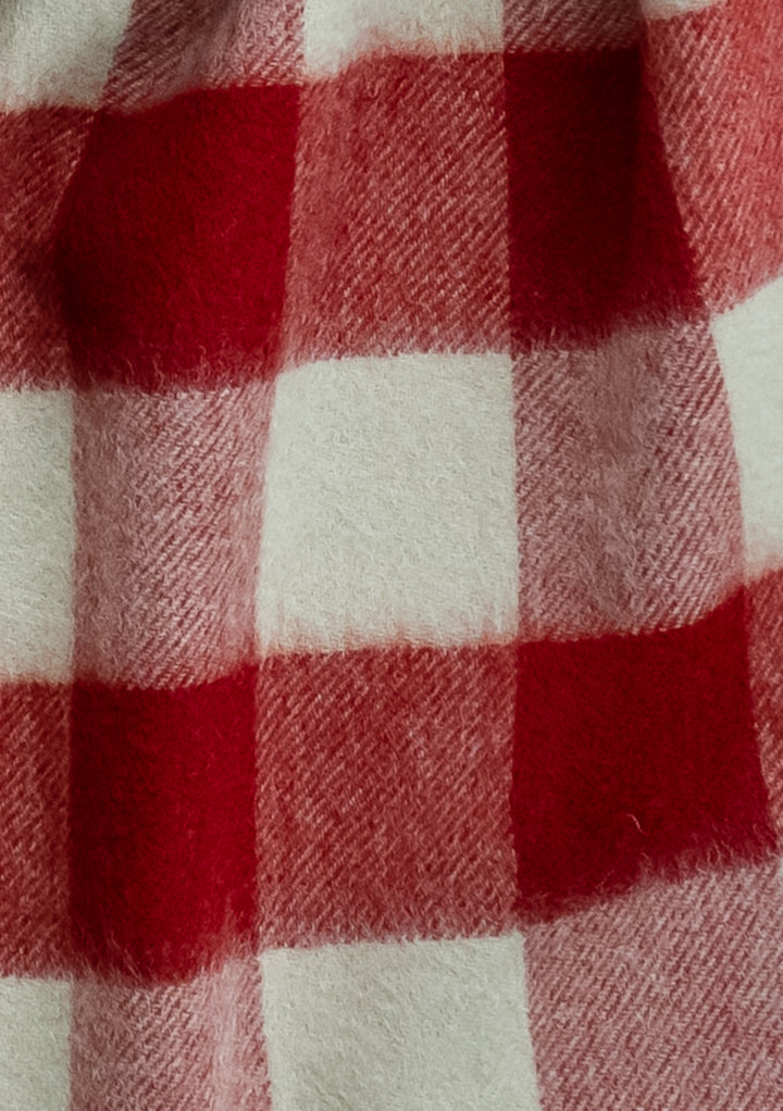 TBCo Lambswool Scarf in Red Gingham featuring soft wool texture with classic red and white checkered pattern close-up view