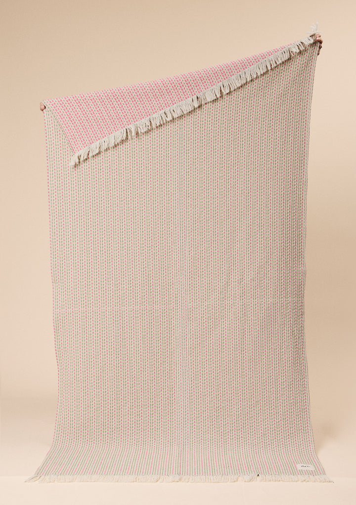 Cotton Throw in Rose Geometric by TBCo with jacquard weave, natural and recycled fibres, Certified B-Corp, women-founded, designed to make an impact