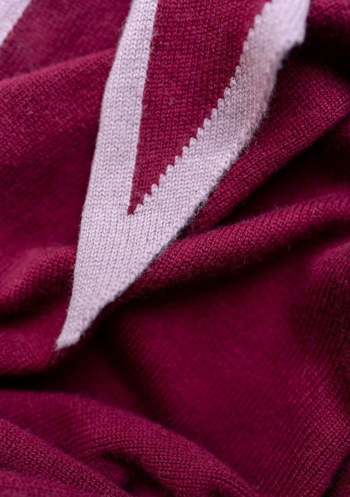 Close-up of TBCo Large Merino Triangle Scarf in Burgundy & Lilac showing soft merino wool knit and lilac edge detail
